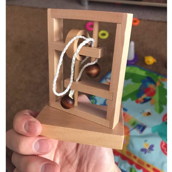Casse tête en bois avec ficelle